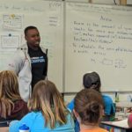 Orion Edwards speaks to students at Hudson's Hope